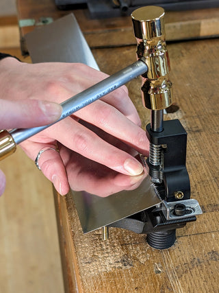 bad axe tool works brass setting hammer in use with hammer saw set