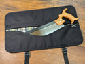 a small backsaw inside of our black saw tool bag