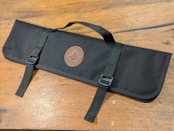 small saw tool bag in black with leather patch